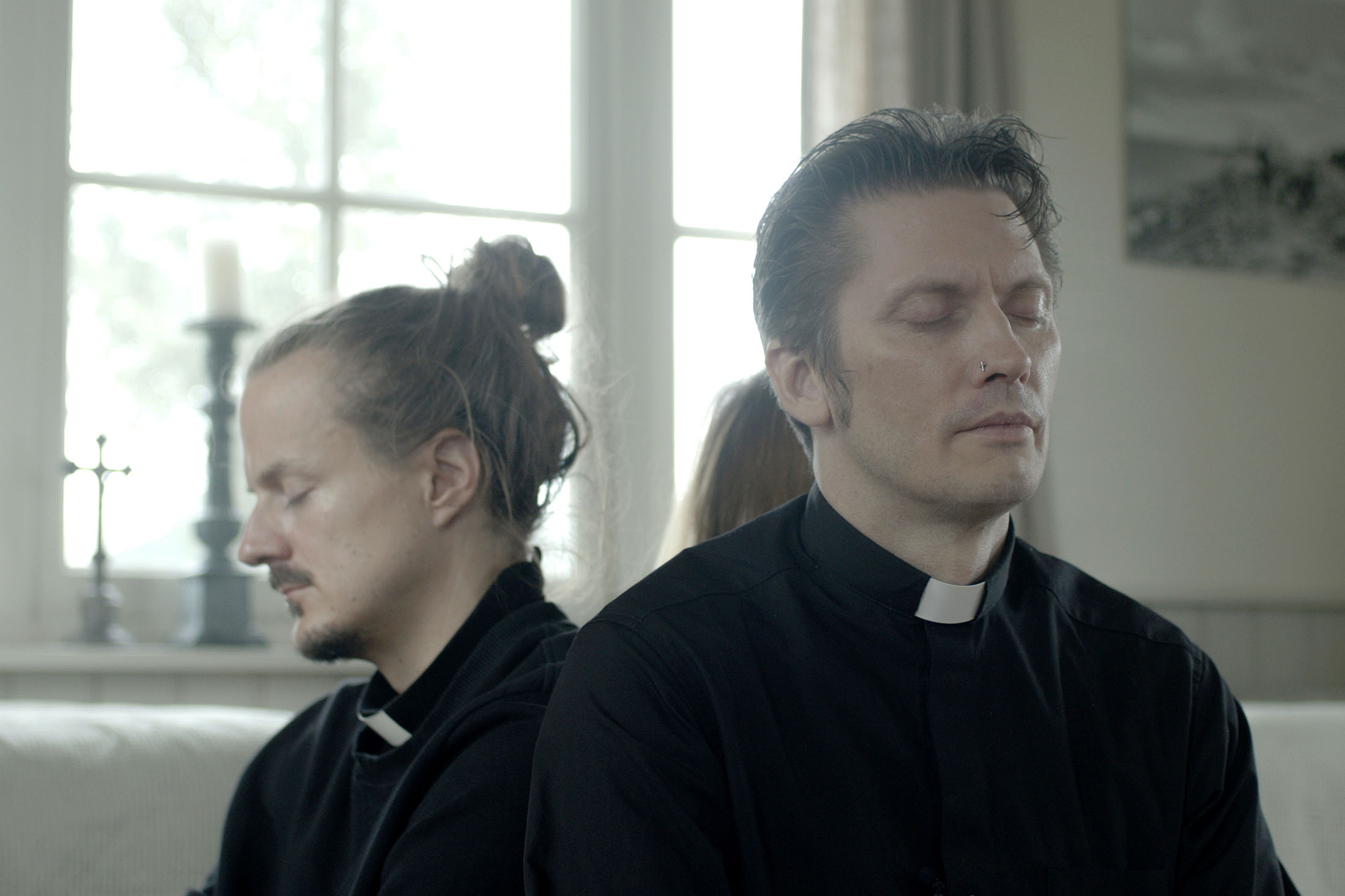 Two priests in meditation